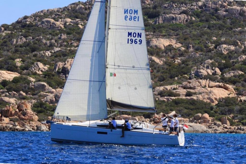 Jeanneau Sun Odyssey 349 2018 Jeanneau Sun Odyssey 349 sailing near rocky coastline.