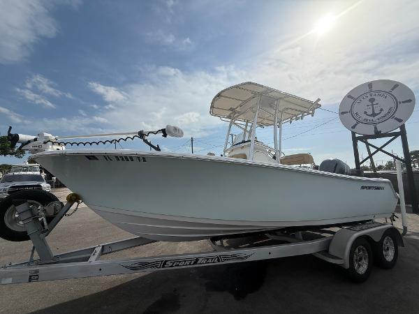 Sportsman 212 open 2016 Sportsman 212 Open boat on trailer under sunny sky.
