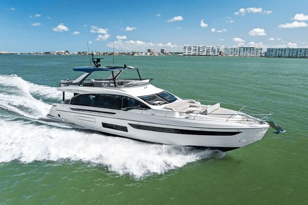 Azimut Fly 72 2025 Azimut Fly 72 yacht cruising on open water under a clear blue sky.