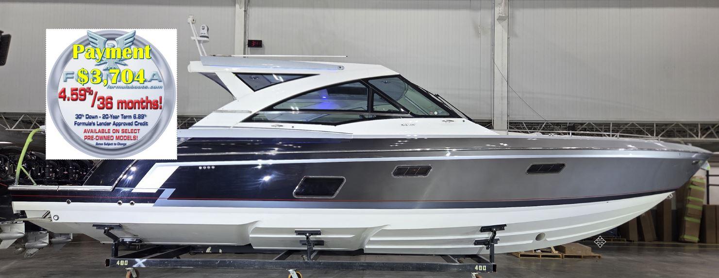 Formula 430 Super Sport Crossover 2020 Formula 430 Super Sport Crossover boat in showroom with financing offer displayed.