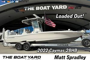 Caymas 28 HB Twin 2022 Caymas 28 HB Twin boat displayed at The Boat Yard, featuring "Loaded Out!" text.
