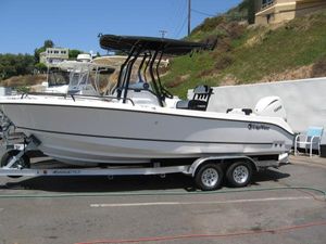 Edgewater 208 WATCHMAN CC 2025 Edgewater 208 WATCHMAN CC boat on trailer, parked outdoors.