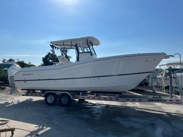 World Cat 295 CC 2024 World Cat 295 CC boat on trailer under clear blue sky.