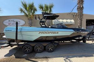 Moomba Tykon 2024 Moomba Tykon boat on trailer, displayed at Boat Town dealership.