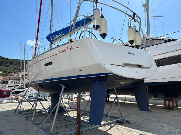 Jeanneau Sun Odyssey 389 Jeanneau Sun Odyssey 389 sailboat, 2018 model, on dry dock with visible keel and rudder.