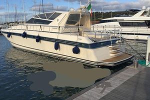 Arno Leopard Leopard 21.50 Luxury yacht Arno Leopard 21.50, 1996 model, docked at marina with Italian flag.