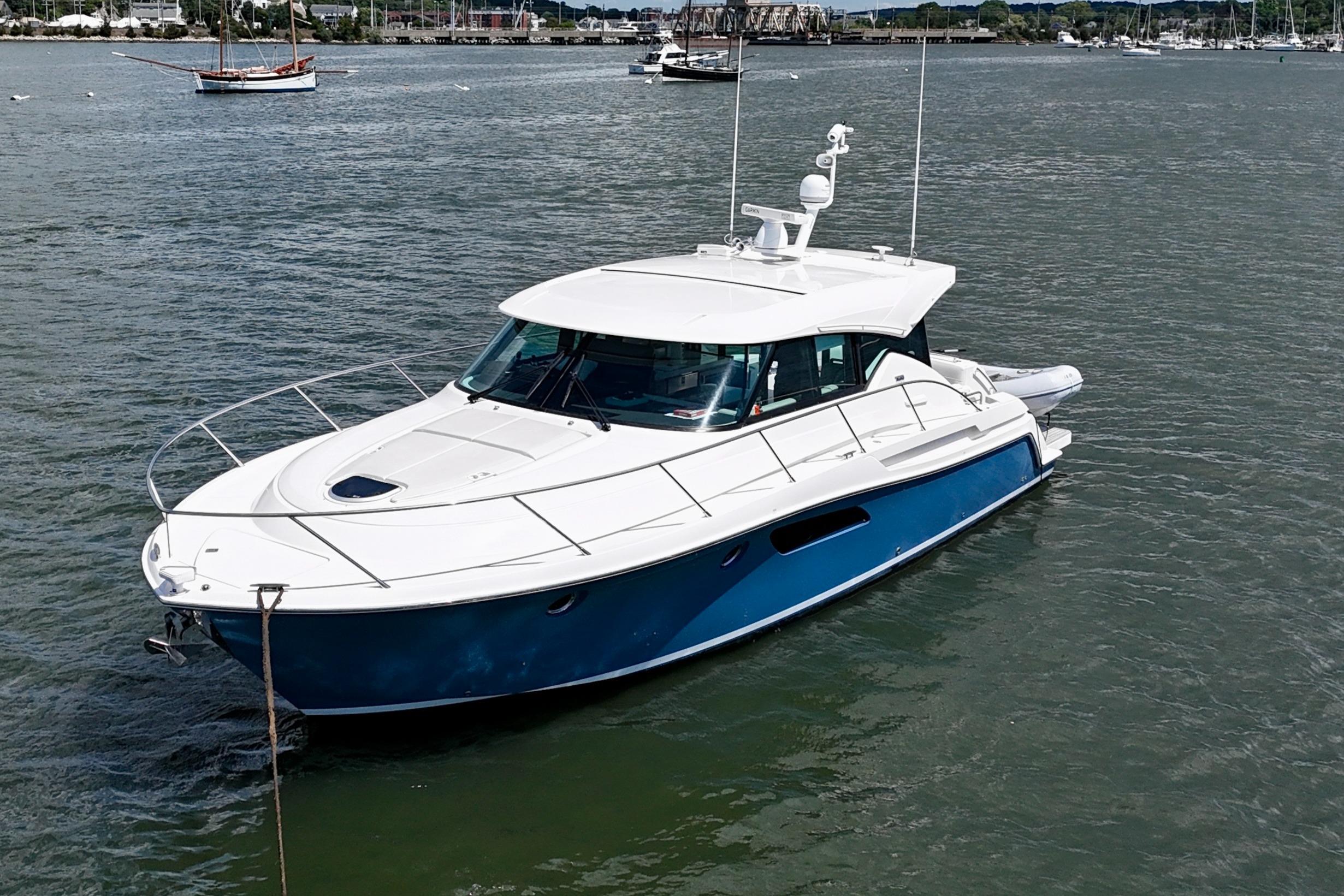 Tiara Yachts C44 Coupe 2017 Tiara Yachts C44 Coupe in water, sleek design, white and blue exterior.