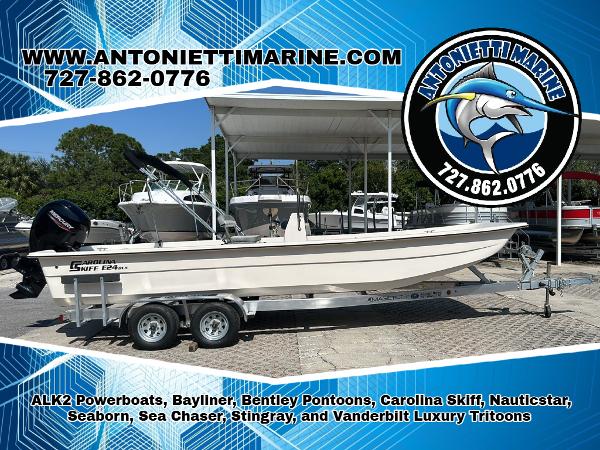 Carolina Skiff E24 DLX CC 2024 Carolina Skiff E24 DLX CC boat on trailer at Antonietti Marine dealership.