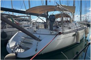 Jeanneau Sun Odyssey 54 DS 2004 Jeanneau Sun Odyssey 54 DS sailboat docked in marina, rear view.