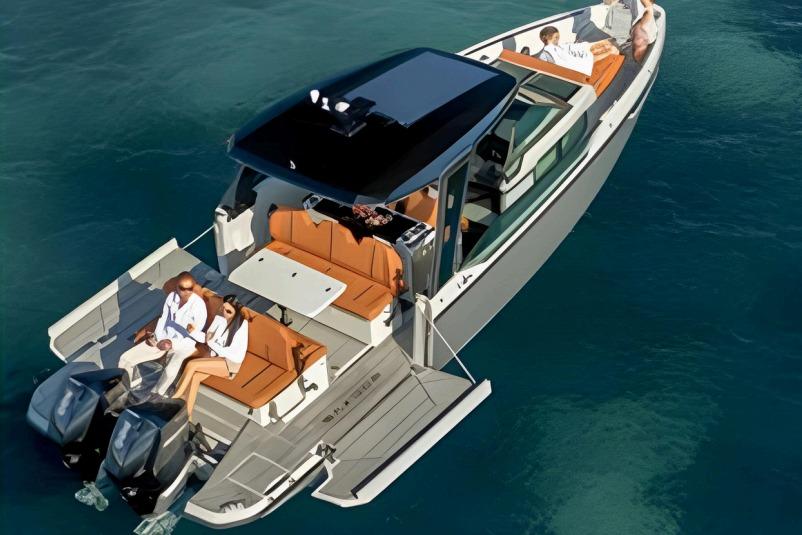 Saxdor 320 GTO 2022 Saxdor 320 GTO luxury boat cruising on clear blue water.