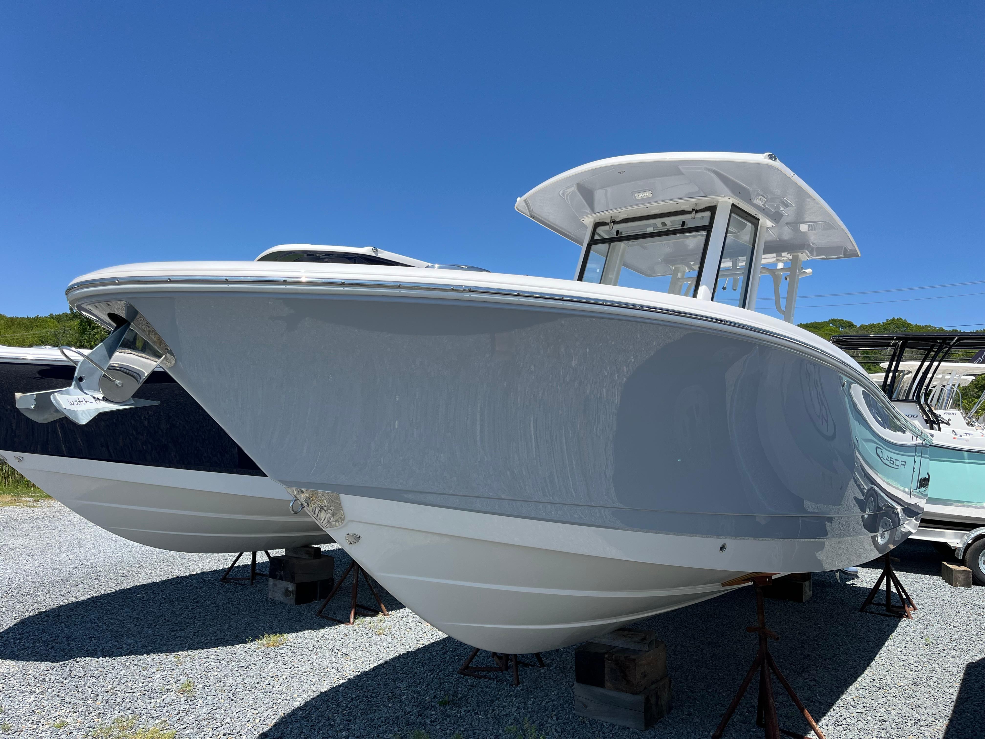 Robalo R270 Center Console 2024 Robalo R270 Center Console boat displayed outdoors on stands.