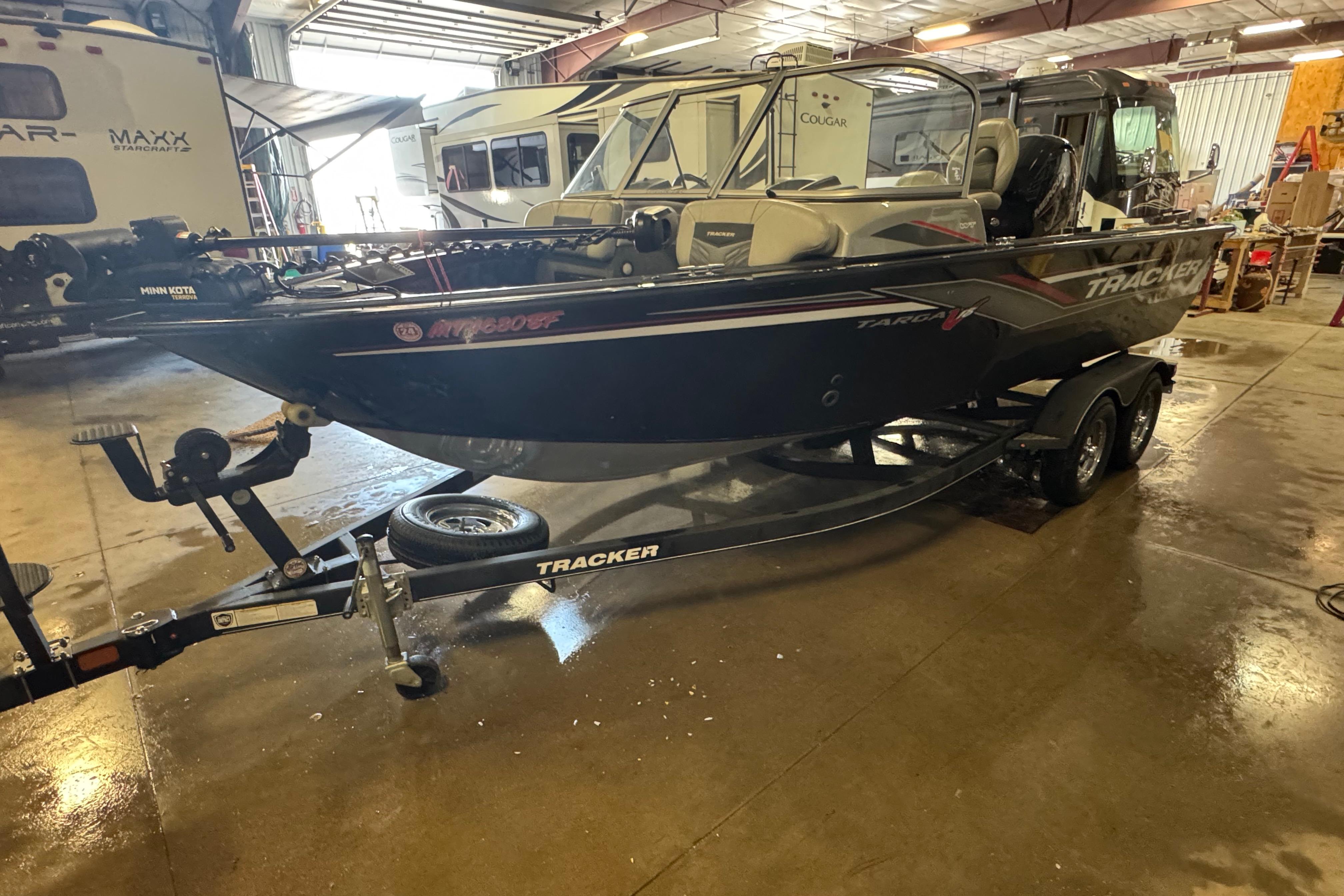 Tracker Targa V-18 WT 2019 Tracker Targa V-18 WT boat on trailer in indoor storage facility.