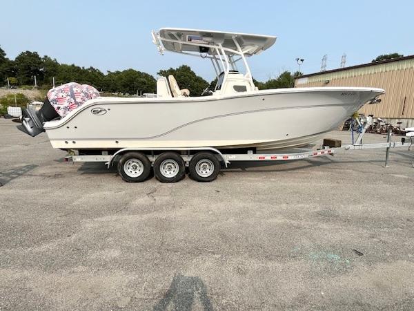 Sea Fox 288 Commander 2018 Sea Fox 288 Commander boat on a trailer in a parking lot.