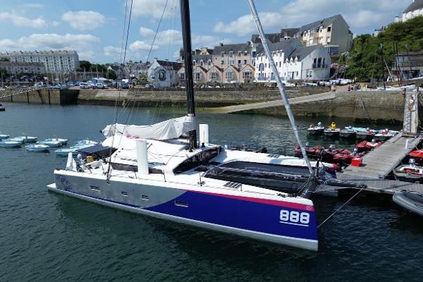 Marsaudon Composites ORC 50 2020 Marsaudon Composites ORC 50 catamaran docked in a scenic harbor.