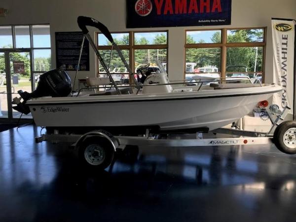 Edgewater 158 CS 2025 Edgewater 158 CS boat on a trailer in a showroom.