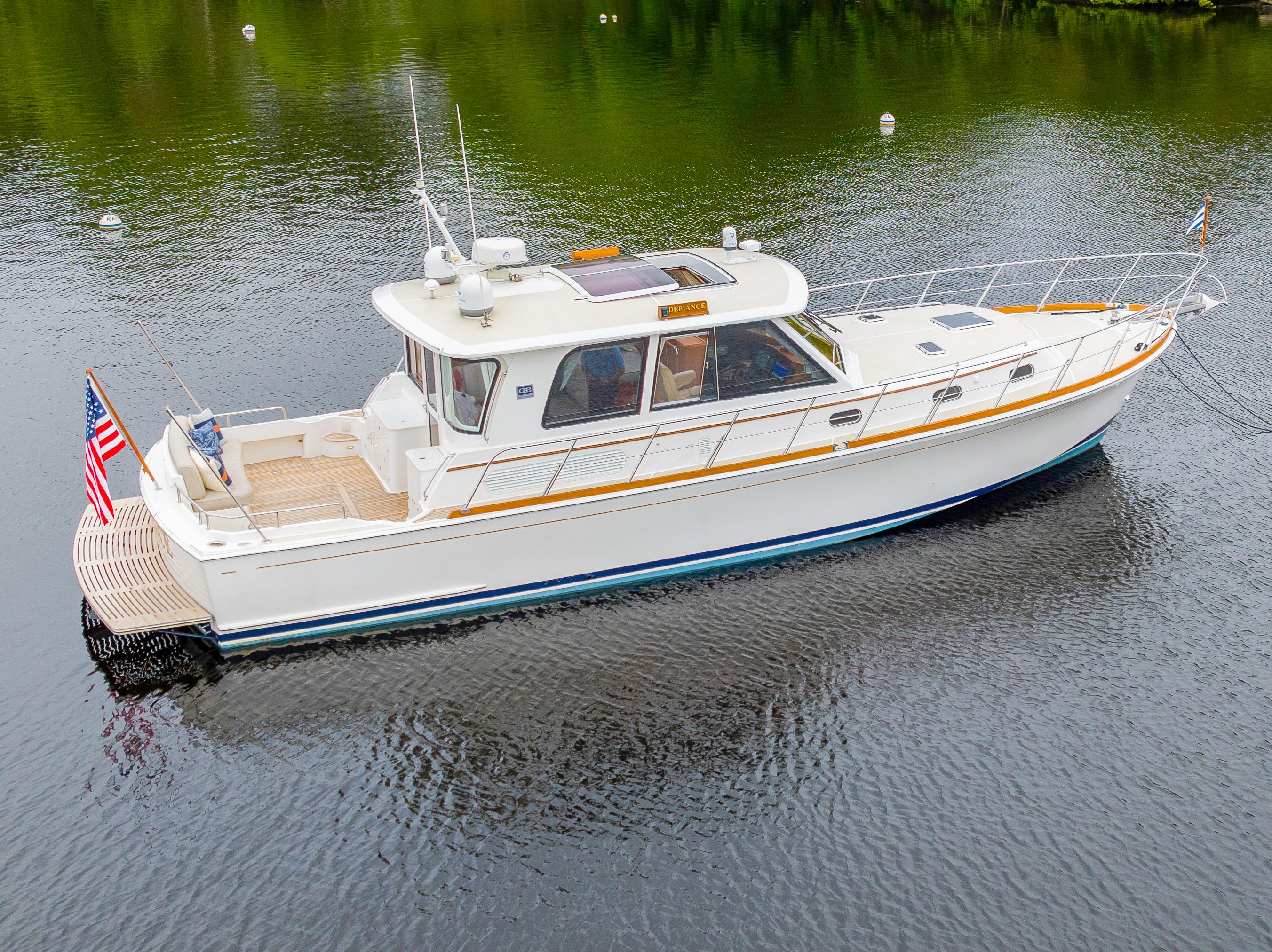 Grand Banks 46 Eastbay SX 2012 Grand Banks 46 Eastbay SX yacht on calm water, side view.