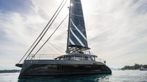 Sunreef Sunreef 60 eco sailing 2024 Sunreef 60 Eco sailing yacht on calm waters under a cloudy sky.
