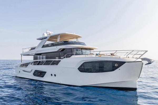 Absolute 70 navetta 2026 Absolute 70 Navetta yacht cruising on open sea.