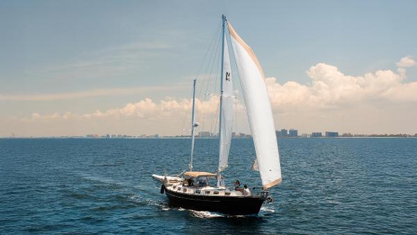 Morgan 462 Ketch 1980 Morgan 462 Ketch sailing on open sea under clear skies.