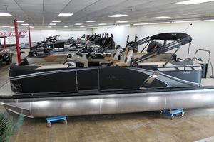 Avalon LSZ Quad Lounger 23 FT 2025 Avalon LSZ Quad Lounger 23 FT pontoon boat displayed indoors.