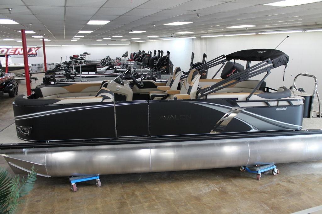 Avalon LSZ Quad Lounger 23 FT 2025 Avalon LSZ Quad Lounger 23 FT pontoon boat displayed indoors.