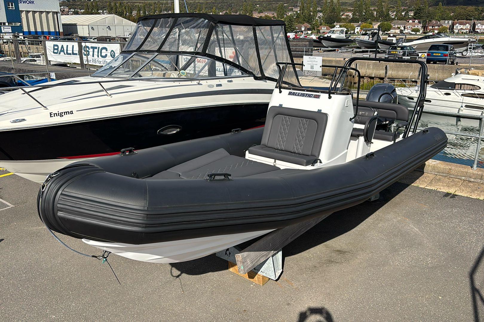 Ballistic LS68 Custom Ballistic LS68 Custom 2025 inflatable boat displayed at a marina with other vessels.