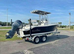 NauticStar 2102 Legacy 2022 NauticStar 2102 Legacy boat on trailer with Yamaha outboard motor.