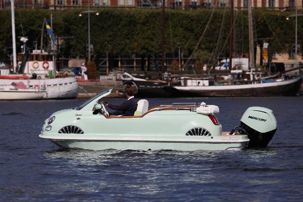Fiat Car Offshore 500 2024 Fiat Car Offshore 500 boat on water, with Mercury outboard motor.