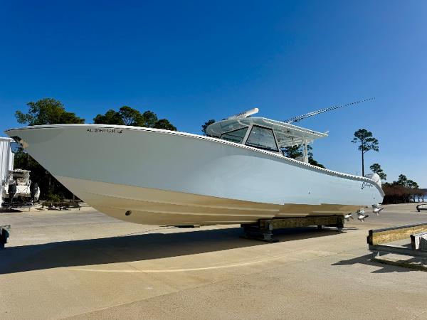 Yellowfin 42 Offshore 2020 Yellowfin 42 Offshore boat on display under clear blue sky.