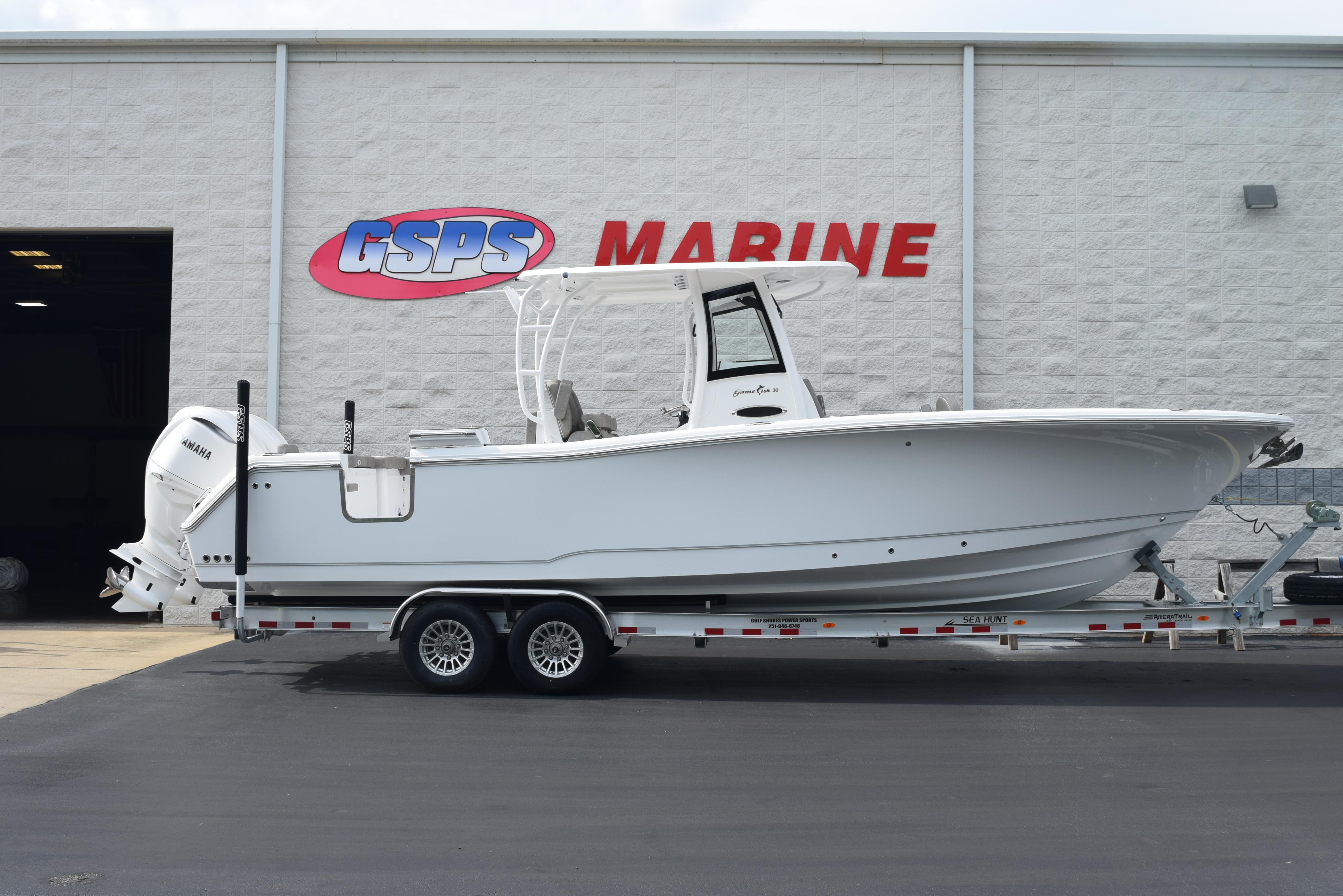 Sea Hunt Gamefish 30 Forward Seating 2026 Sea Hunt Gamefish 30 boat on trailer at GSPS Marine dealership.