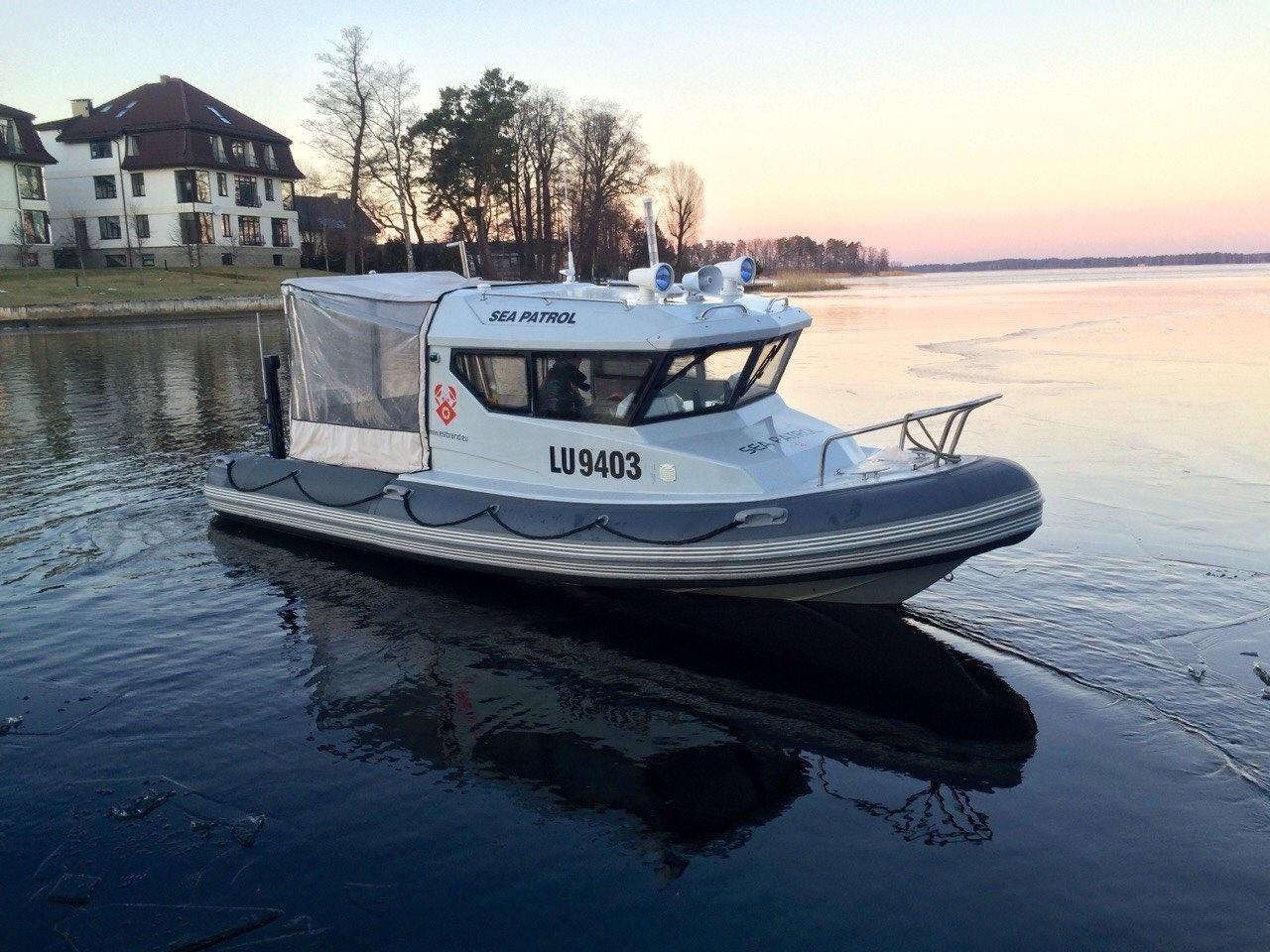 Custom Bush 645 (Sea Patrol 630) Custom Bush 645 Sea Patrol boat on calm water near residential area, 2013 model.