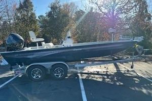 Ranger RB200 2024 Ranger RB200 boat on trailer in sunny outdoor setting.