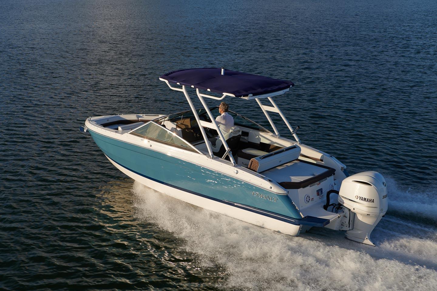 Cobalt R4 Outboard 2026 Cobalt R4 Outboard boat cruising on water with Yamaha engine.