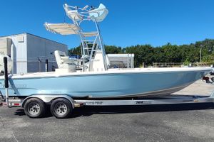 Pathfinder 2500 Hybrid 2023 Pathfinder 2500 Hybrid boat on trailer, light blue hull, sunny day.