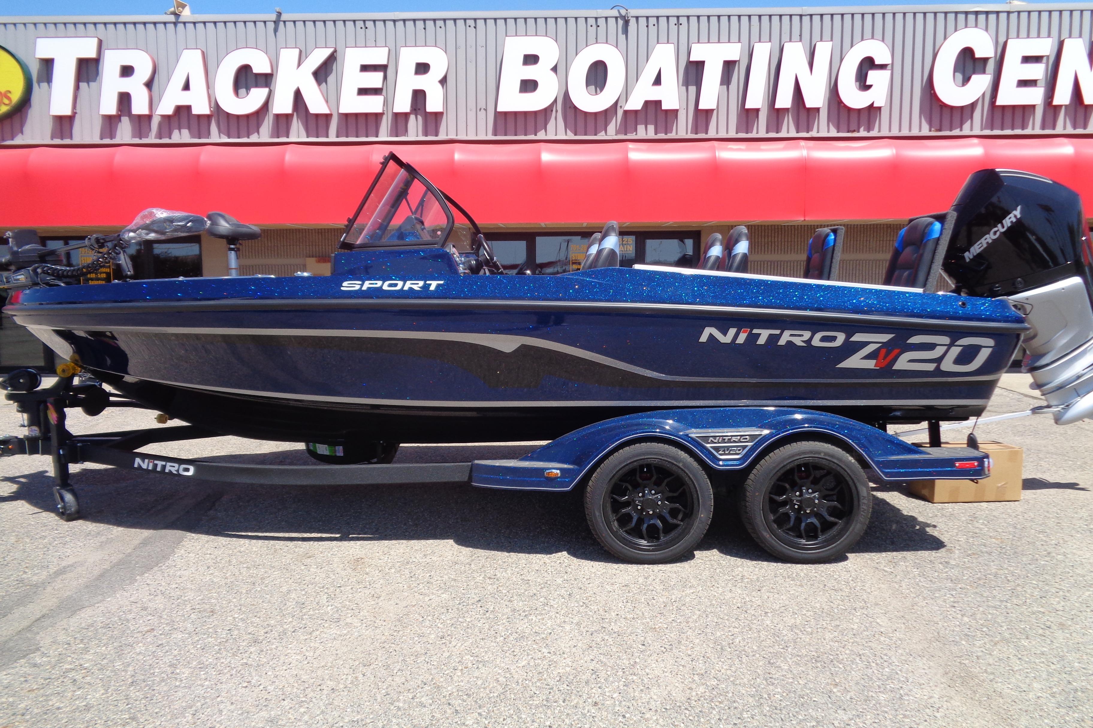Nitro ZV20 Sport 2025 Nitro ZV20 Sport boat at Tracker Boating Center, blue with trailer.
