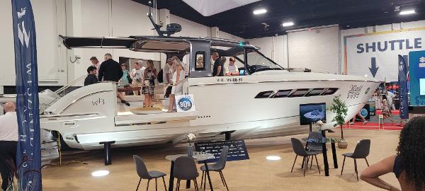 Wiszniewski Yachts W43 2024 Wiszniewski Yachts W43 on display at a boat show, featuring sleek design and modern amenities.