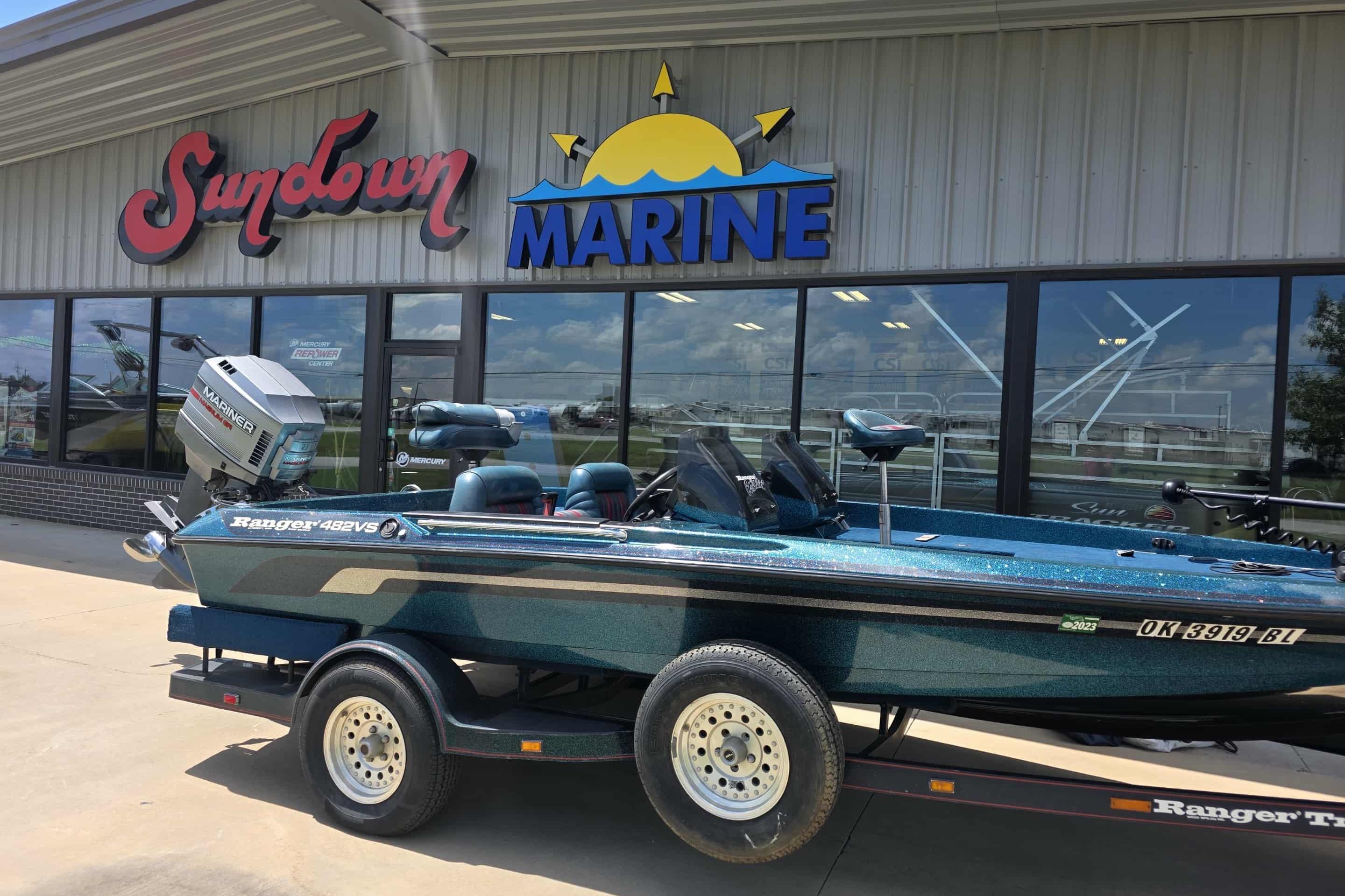 Ranger 482 V 1994 Ranger 482 V boat on trailer outside Sundown Marine store.