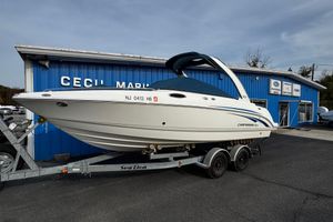 Chaparral 256 SSi 2008 Chaparral 256 SSi boat on trailer outside Cecil Marine dealership.