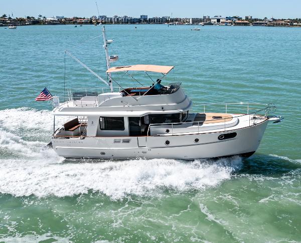 Beneteau Swift Trawler 44 2012 Beneteau Swift Trawler 44 cruising on open water, showcasing sleek design and performance.