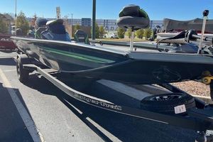 Ranger RT198P 2026 Ranger RT198P boat on trailer, parked outdoors, showcasing sleek design and modern features.