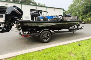 Ranger RT178 2026 Ranger RT178 boat with Mercury engine on trailer, parked near a building.