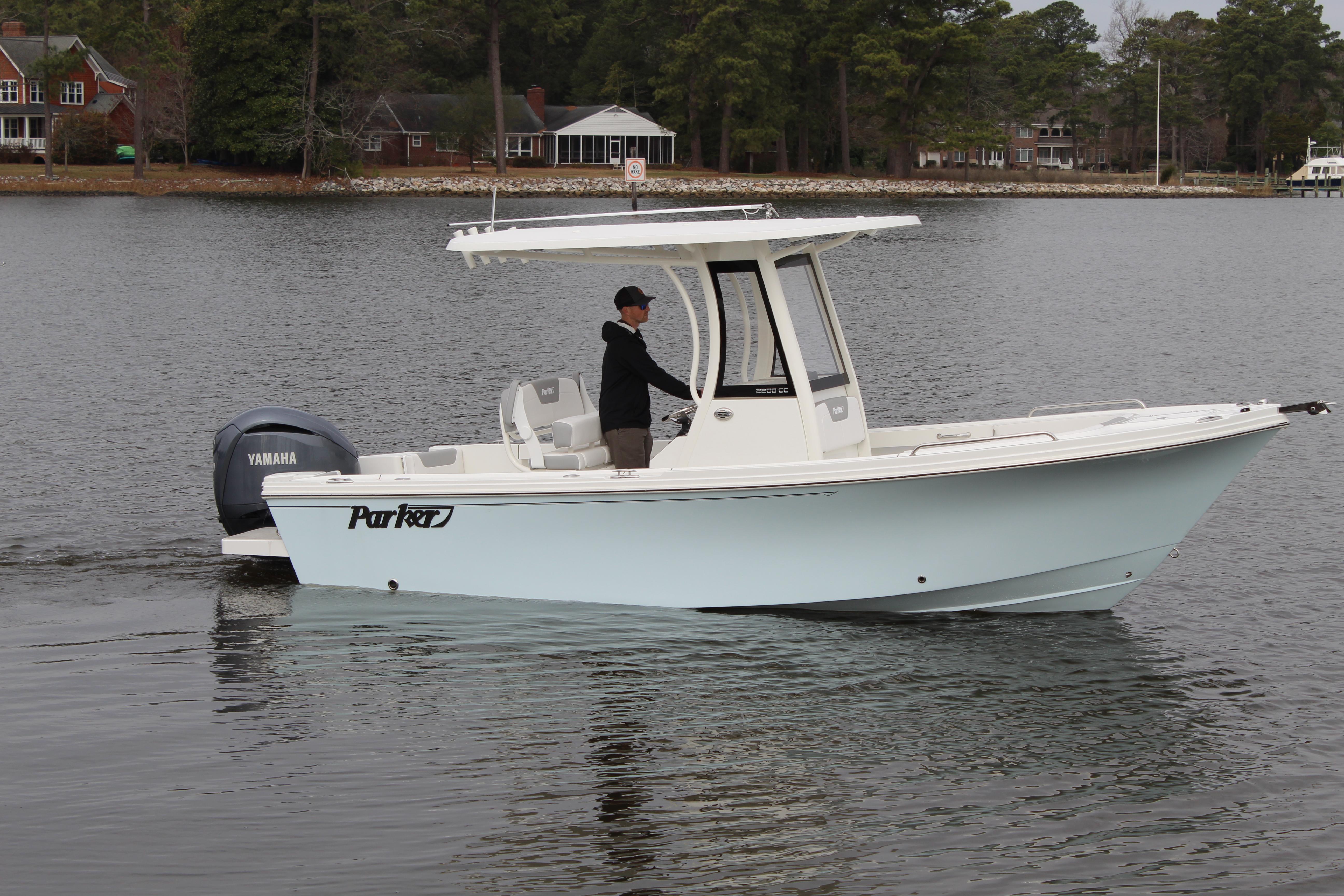 Parker 2200 Center Console 2025 Parker 2200 Center Console boat on calm water, featuring a Yamaha engine.