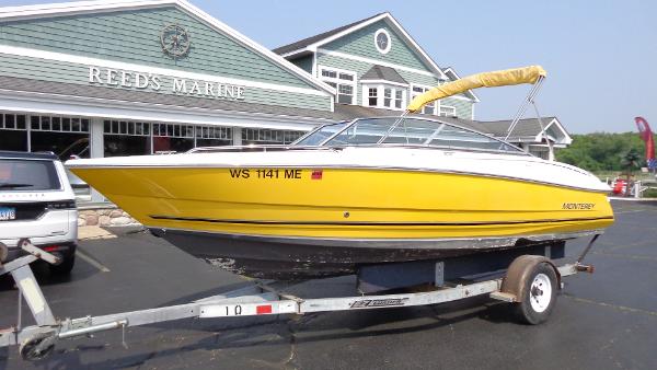 Monterey 214 FS 2007 Monterey 214 FS yellow boat on trailer at Reed's Marine.