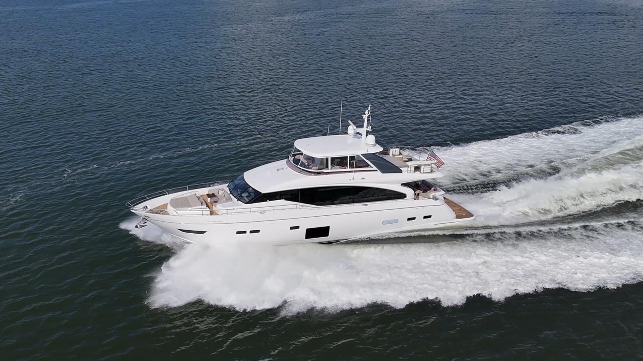 Princess Y88 Motor Yacht Luxurious 2019 Princess Y88 Motor Yacht cruising on open water.