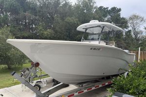 Sea Fox 286 Commander 2015 Sea Fox 286 Commander boat on trailer, surrounded by trees.