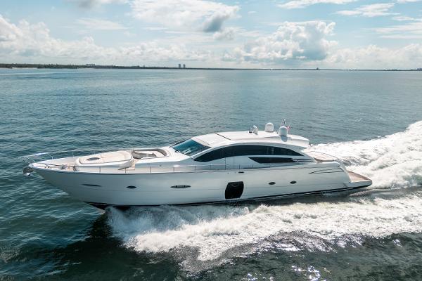 Pershing 80 Luxurious 2010 Pershing 80 yacht cruising on open water under a clear sky.