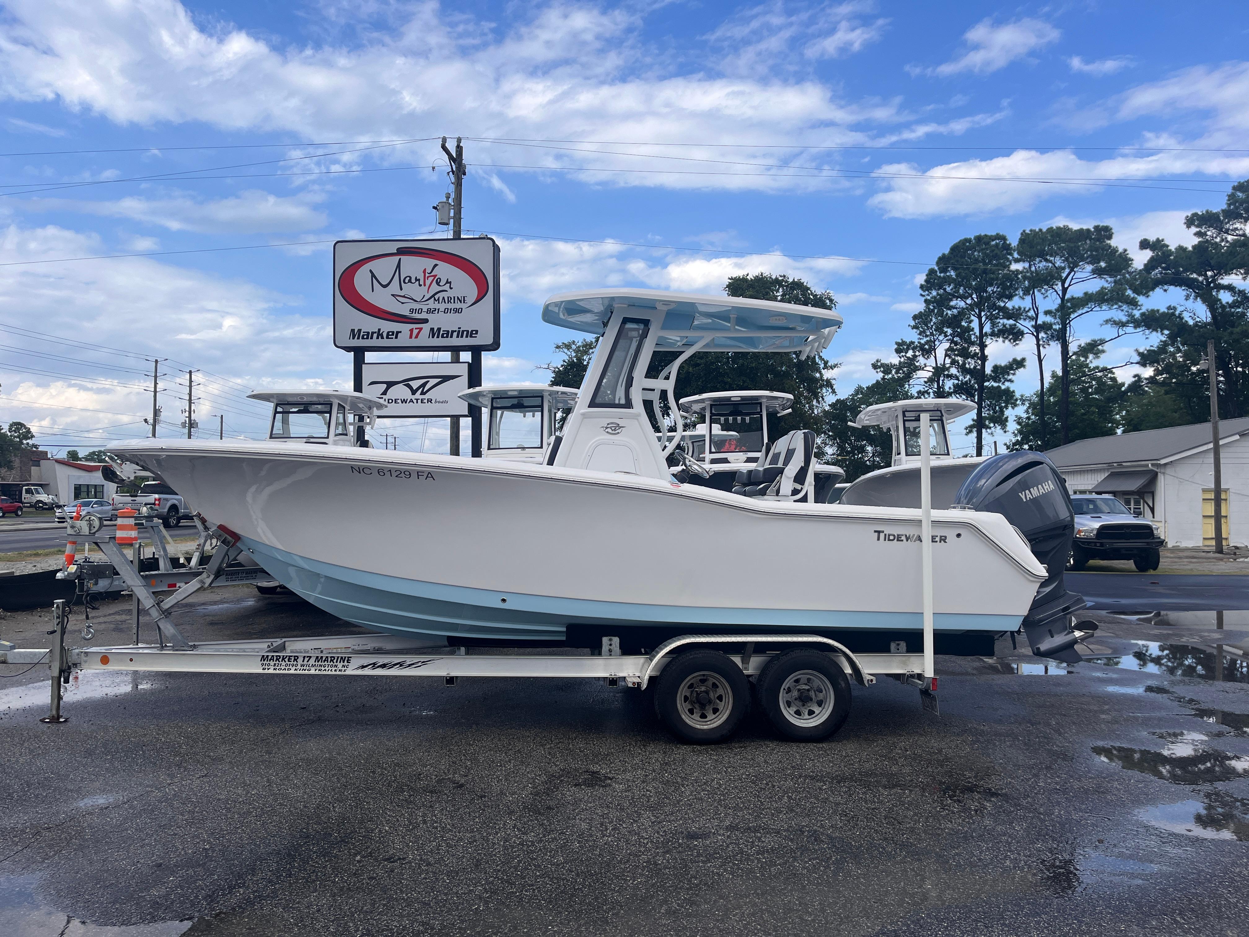 Tidewater 232 CC Adventure 2023 Tidewater 232 CC Adventure boat on trailer at Marker 17 Marine dealership.