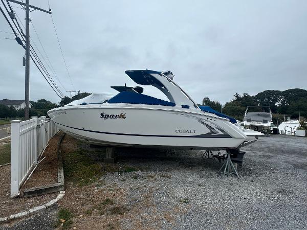 Cobalt R5 Surf 2020 Cobalt R5 Surf boat on display in a parking area.