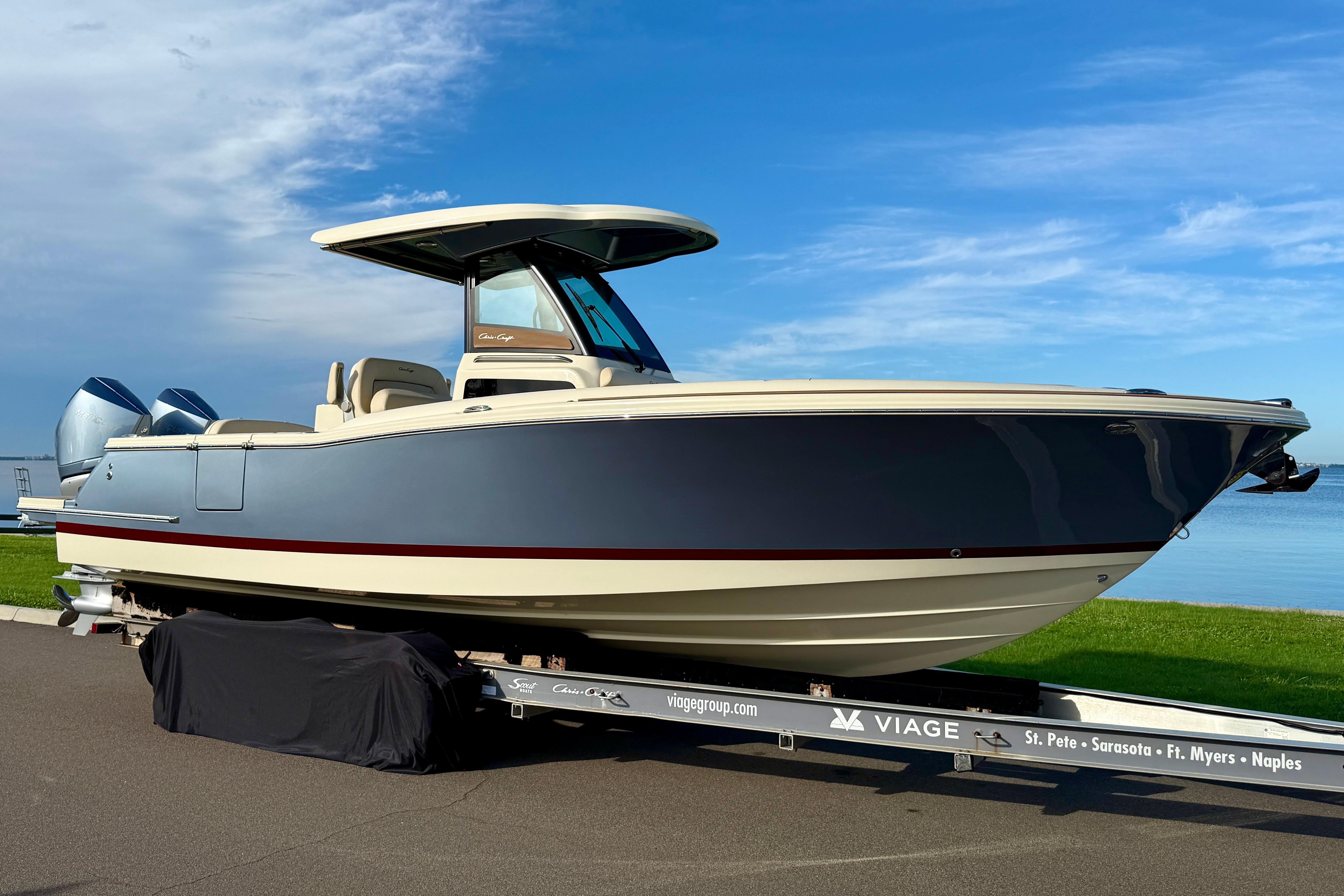 Chris-Craft Catalina 28 2025 Chris-Craft Catalina 28 boat on trailer, blue sky background.