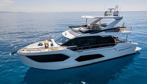 Absolute 60 Fly Luxury Absolute 60 Fly yacht cruising on calm blue waters, 2023 model.